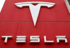 Tesla hits trillion-dollar after Trump win